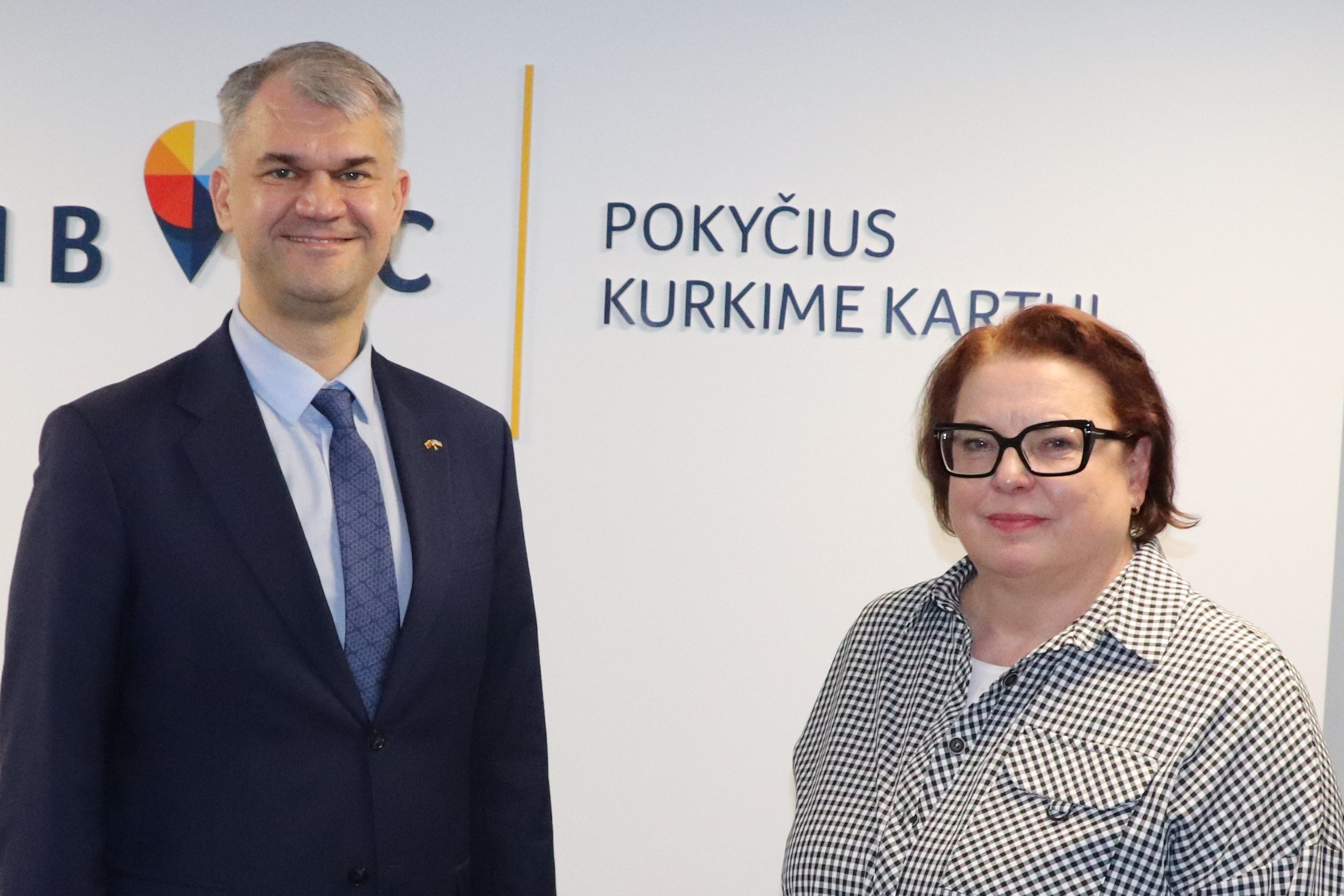 Finansų ministerijos kancleris M. Šima ir NBFC direktorė V. Kulvinskienė